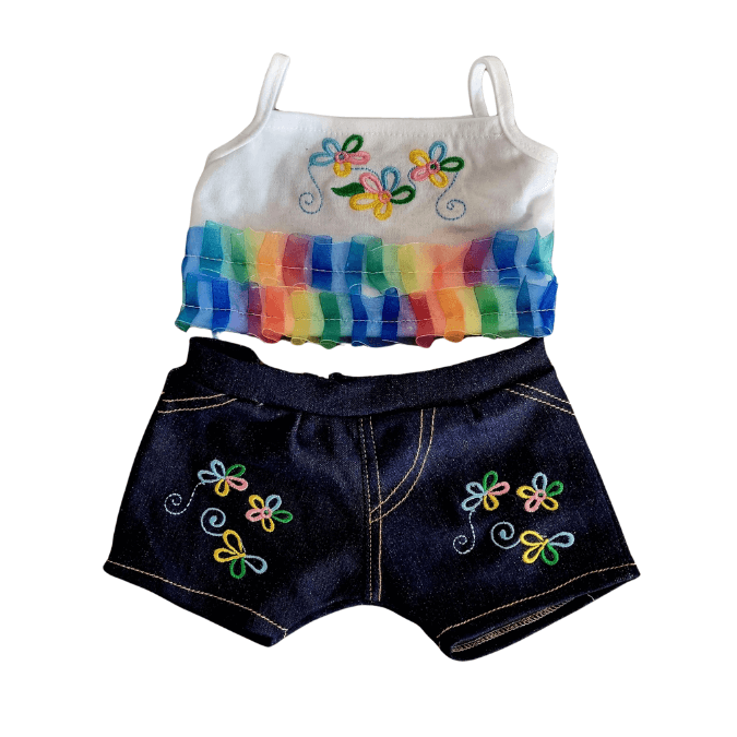 Flower jeans set - voor knuffel - Make a bearFlower Jeans set met een zomers topje met spaghettibandjes en geborduurde bloemen, gecombineerd met een spijkerstof broekje voor knuffels.